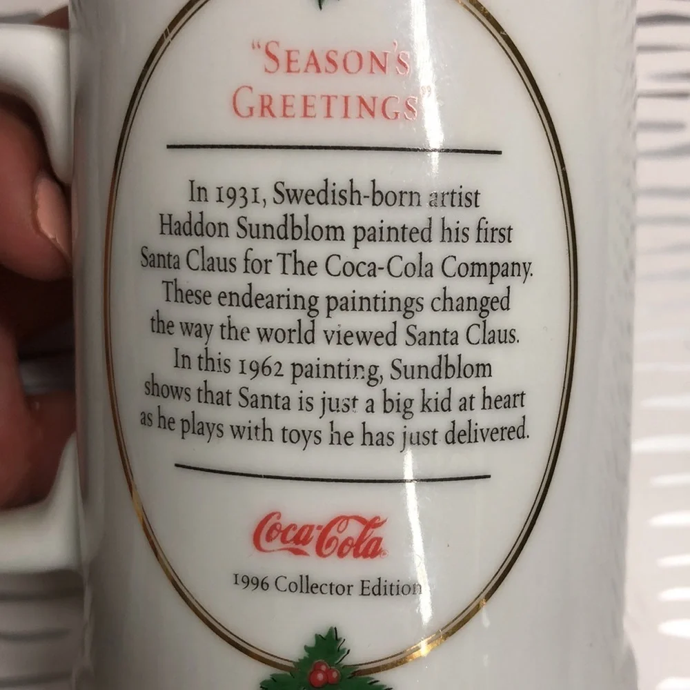 Ultímate source Christmas mug Coca Cola collectors